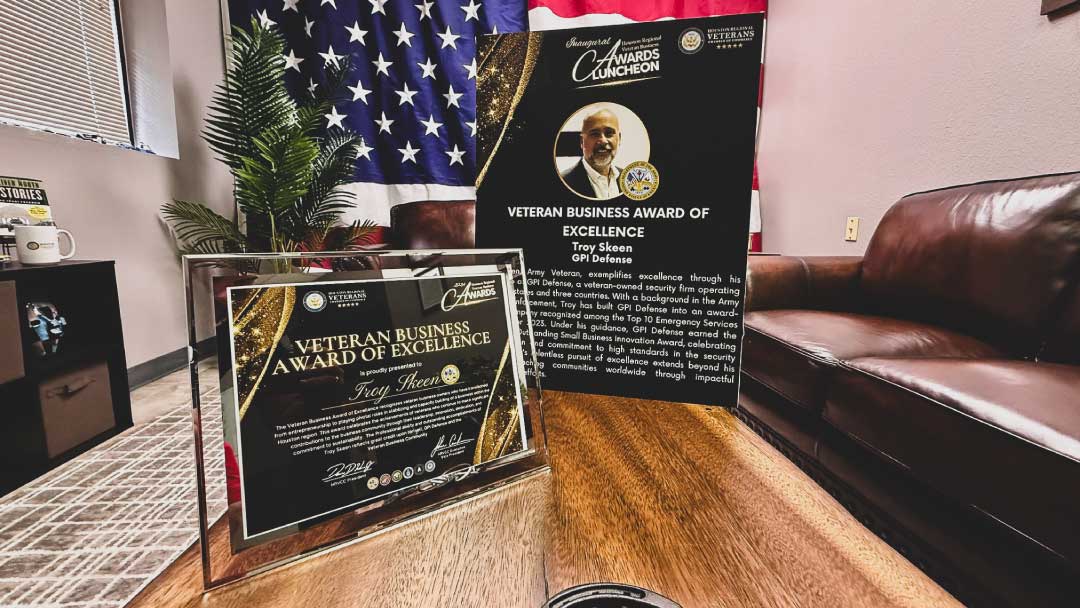 GPI Defense Veteran Business Award of Excellence from the Houston Regional Veterans Chamber of Commerce, staged with the award on display.