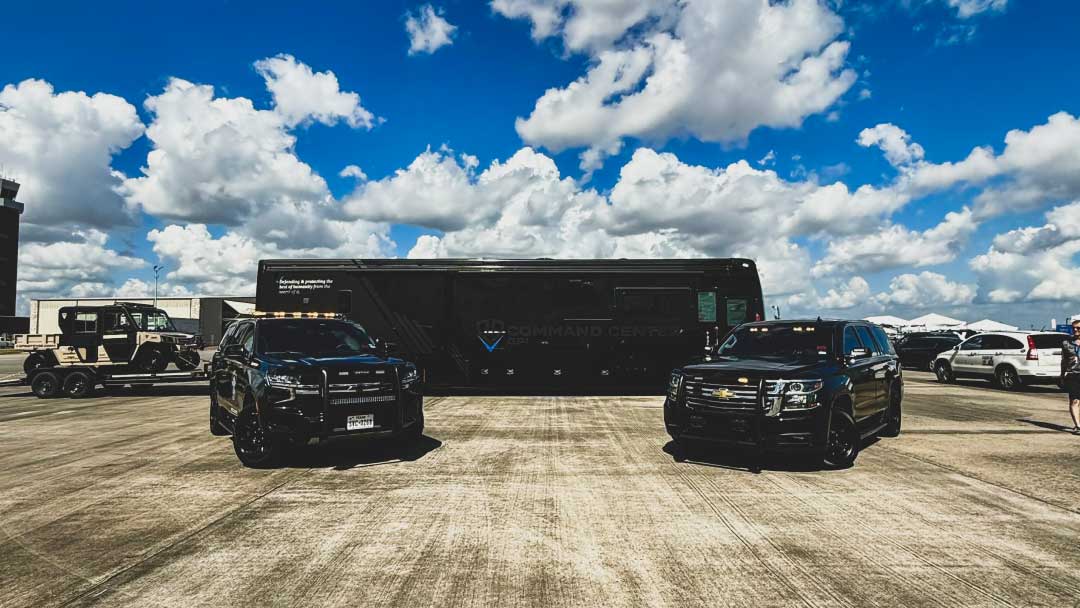Emergency response planning vehicles and mobile command center at government air show, operated by GPI Defense