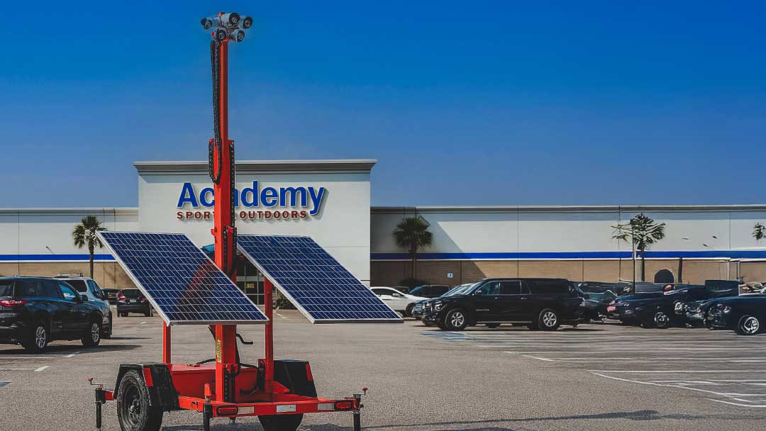 Retail parking lot security trailer with cameras deployed outside Academy Sports in Houston, Texas