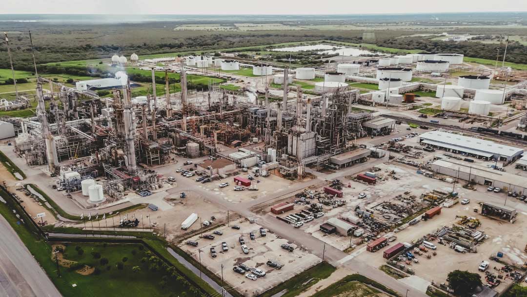 Aerial view of oil refinery in San Antonio highlighting energy infrastructure security and access control needs