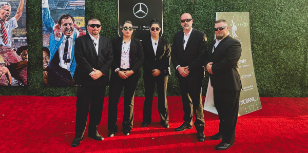 Executive protection team in Houston TX from GPI Defense providing professional bodyguard services at a high-profile red carpet event.