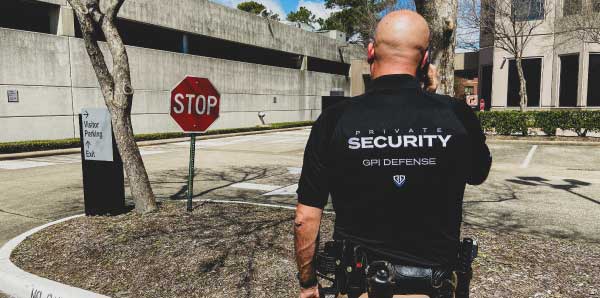 GPI Defense security officer in Houston TX conducting perimeter patrol during a security audit.